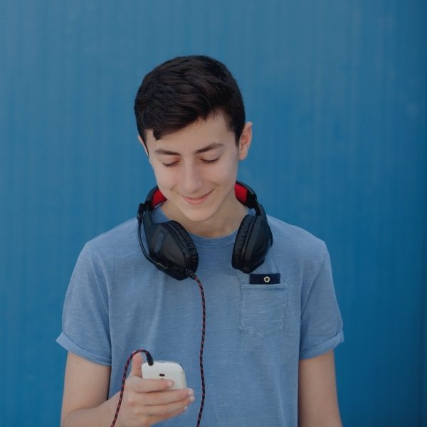 young male looking at phone