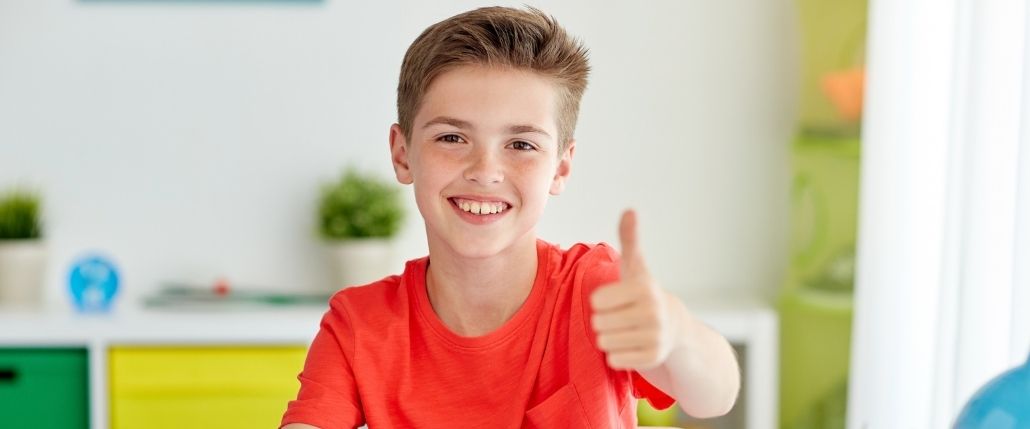 Boy giving a thumbs up